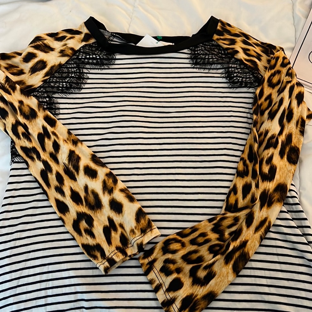 NWT cheetah and black stripes long sleeve top.